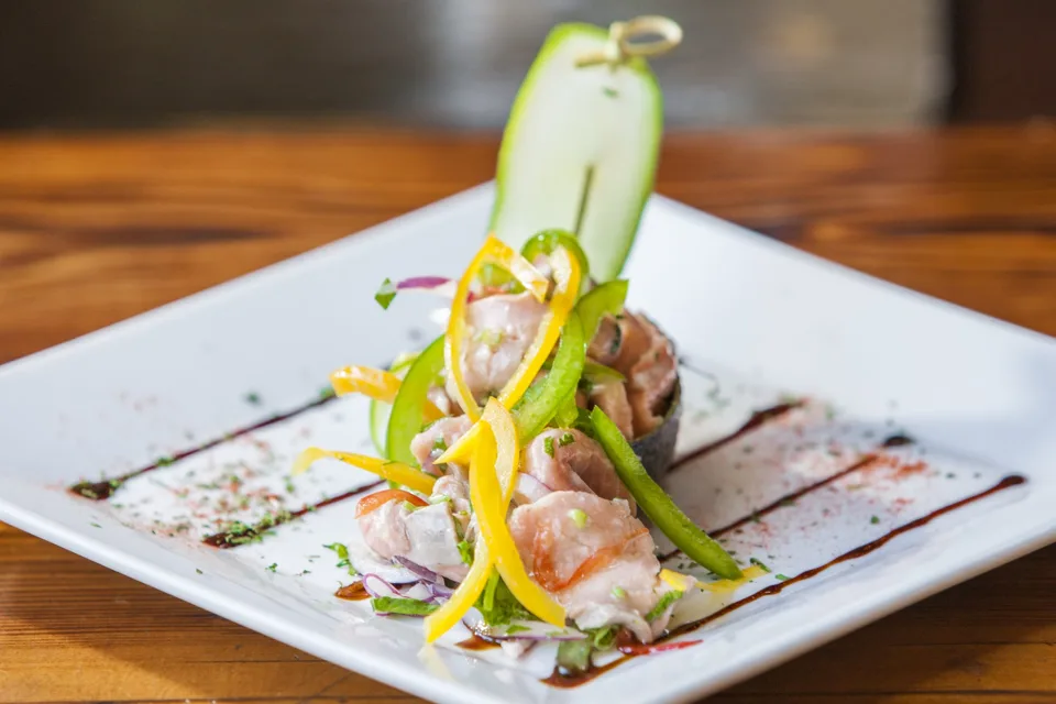 Ceviche tower plated with citrus