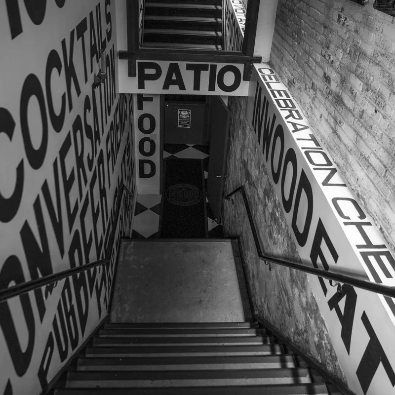 The staircase with painted typography walls